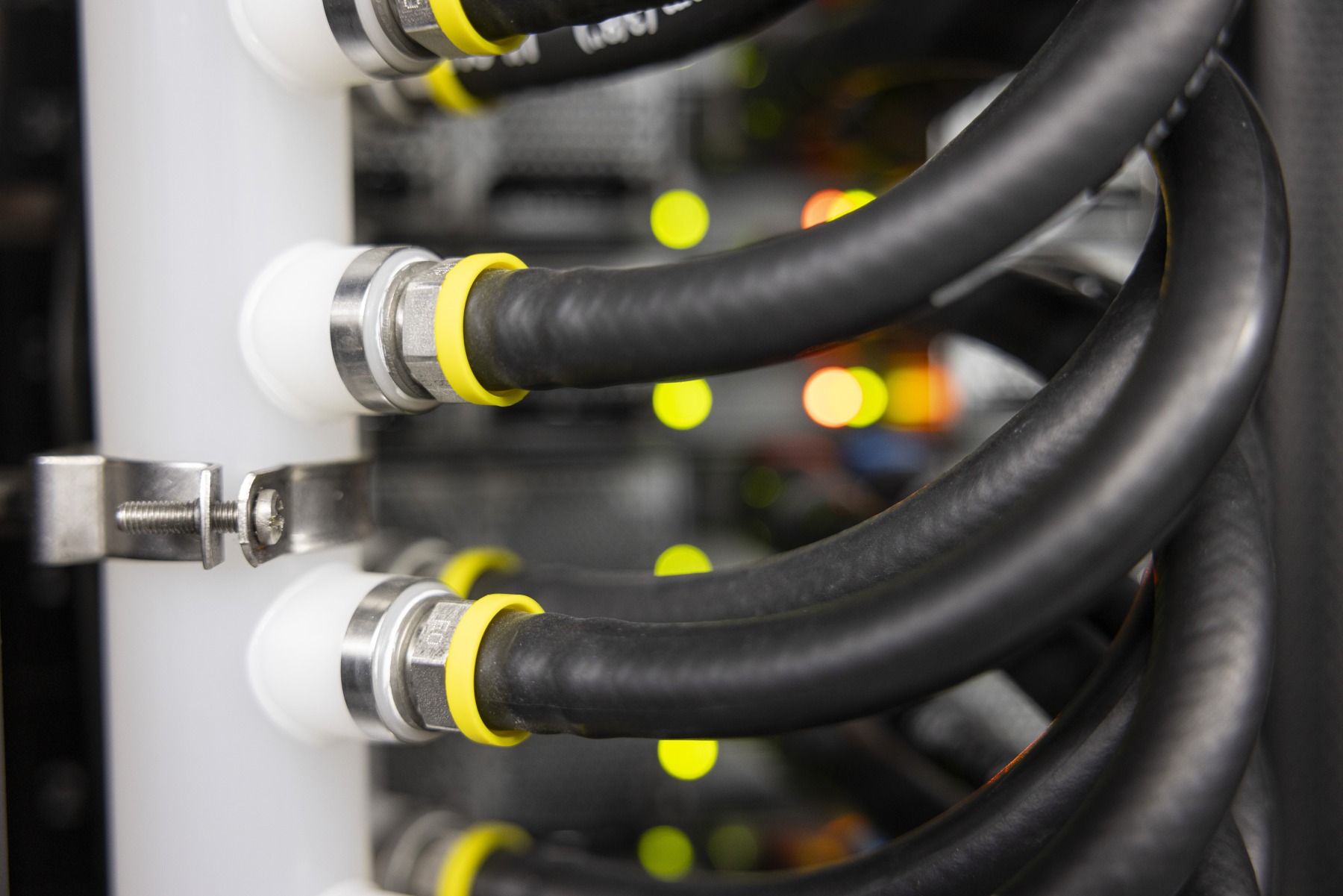 GF PVDF in-rack manifold — original high-resolution photograph of branch connections and mounting detail; exact coupling order codes are not inferred from appearance.